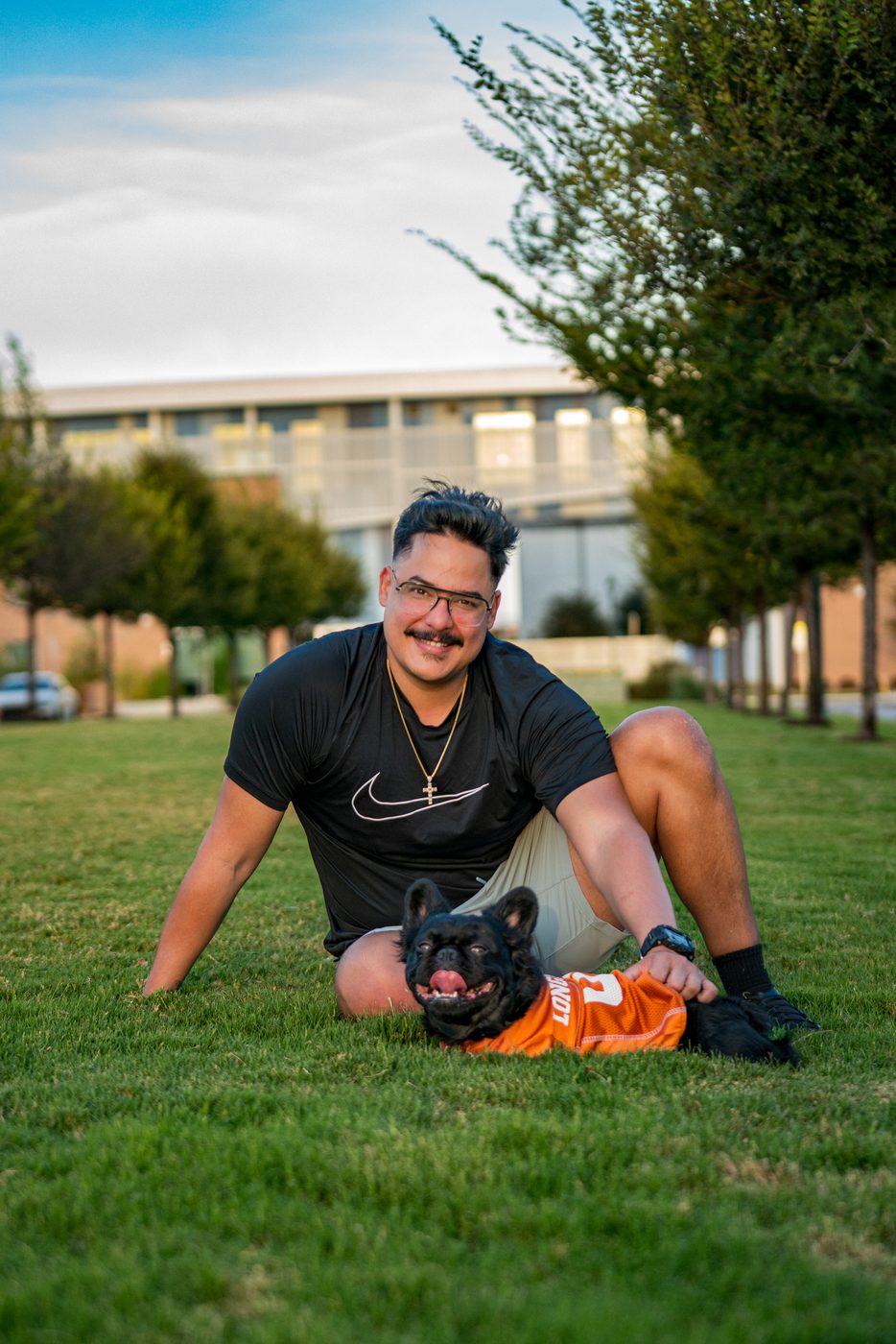 Fernando Sanchez, photographer at 512 Capitol Media, with his French bulldog in Austin